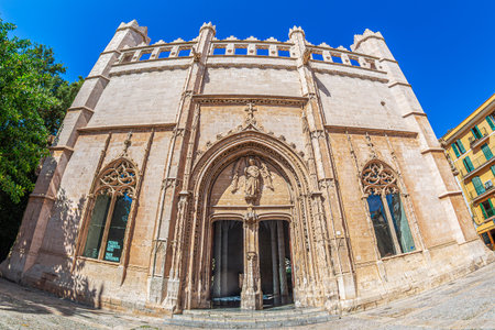 PALMA DE MALLORCA, SPAIN - SEPTEMBER 22, 2023: Front view of Llotja dels Mercaders, or Llotja de Palma or La Lonja de los Mercaderes, a historic building built 1426-1447. Bourgeois Gothic architecture.のeditorial素材