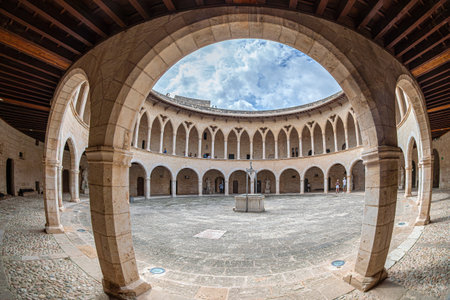 PALMA DE MALLORCA. SPAIN - SEPT 21, 2023: Inner yard of the Circular Gothic Bellver Castle (Castillo de Bellver) built by architect Pere SalvÃ  in 1300-1311 for King James II of Aragon and Majorca.のeditorial素材