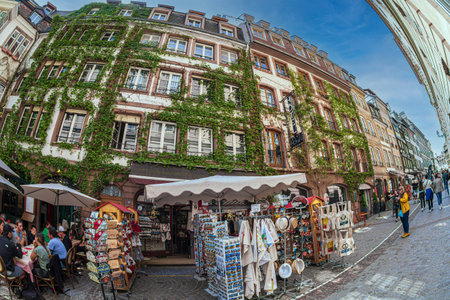 STRASBOURG, ALSACE, FRANCE - MAY 4, 2023: Typical Alsatian architecture on Rue du Maroquin, an area in the historic and medieval center of the city, full of tourists.のeditorial素材