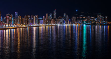Panoramic night view of cityscape of Benidorm, Spain. The city is considered the Manhattan of Spain and Balcony of the Mediterranean.の写真素材