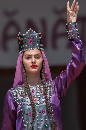 TIMISOARA, ROMANIA - JULY 7, 2019: Young dancer girl from Georgia in traditional costume present at the international folk festival, International Festival of hearts, organized by the City Hall.のeditorial素材