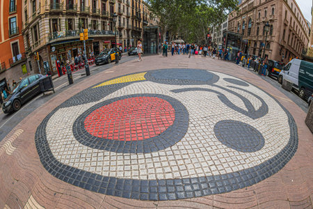 Barcelona, Catalonia, Spain - April 15, 2024:Mosaic by Joan Miro located in La Rambla, Ciutat Vella. It is designed by the Catalan artist to welcome tourists arriving to Barcelona by land, sea and airのeditorial素材