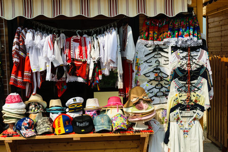 flea market - modern caps and traditional romanian blousesのeditorial素材