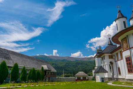 Cheia, Romania - August 15, 2018: Exterior courtyard of  Cheia Monastery in Cheia, Prahova, Romania.のeditorial素材