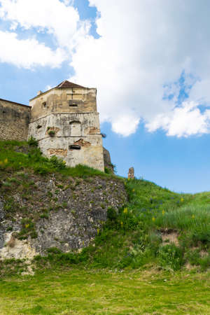 Detail of Rasnov Fortress protection tower build on top of solid bed rockの写真素材