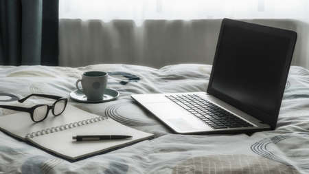 Morning work laptop coffee relaxingの写真素材