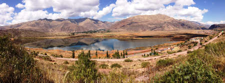 Natural landscape of a lake surrounded by mountains in Cuscoの写真素材