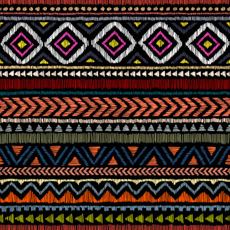 Embroidered ethnic seamless pattern. Aztec and tribal motifs. Striped ornament hand drawn. Print in...
