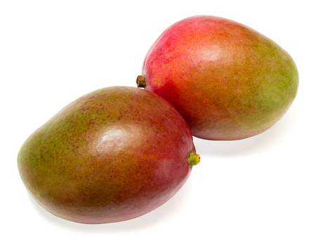 Two mangoes isolated on white backgroundの写真素材