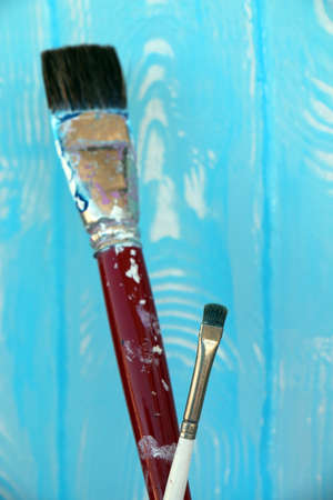 Paintbrushes with imitation of wooden texture in the backgroundの写真素材