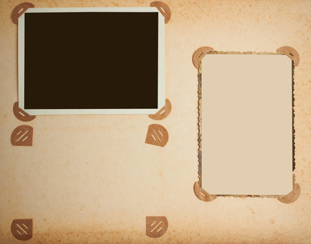 old-fashioned photo frames in vintage album