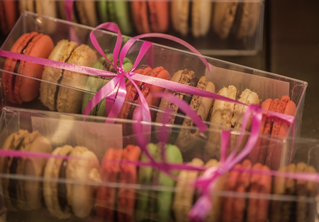 French colorful macaroons on the shelf for sale and giftの写真素材