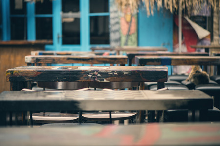 Wooden bar racks of an abandoned cafe on the streetの写真素材