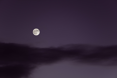 Huge full moon on the night sky.の写真素材