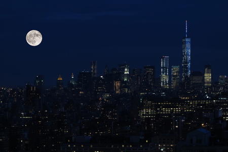 Aerial and panorama view of skyscrapers of New York City, Manhattan.  Top view of night midtown of Manhattan with stars and moon.の写真素材