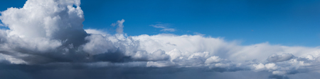 Panoranic gray and white overcast sky. Beautiful cloudscape over horizon, sky.の写真素材