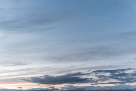 Twilight sky with effect of light pastel colors. Colorful sunset of soft clouds.