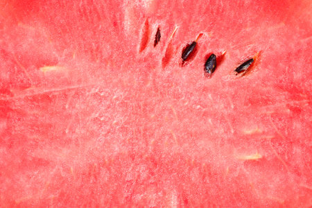 Texture of the huge ripe piece of watermelonの写真素材