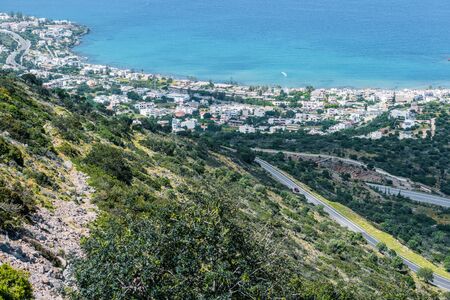 Top view from the mountains to the village of Malia, roads and the nearby villages of the field and the Aegean Sea. Crete, Greeceの写真素材