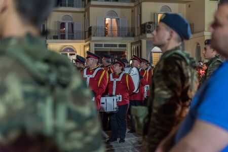 Heraklion, CRETE, GREECE - 28 APRIL 2019: Easter celebration night outside Agios Minas Cathedral. A marching band and military parade in the old town of Heraklion.のeditorial素材
