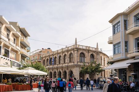 Local people, tourists walking on a famous Heraklion street in historical center. Shopping road. Crete. Greece.の写真素材