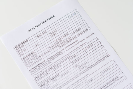 Hotel reservation form on the table at the office. Rental agreement apartment, house. Close up....