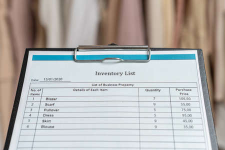 Ð¡lipboard with inventory list in trendy woman clothing shopの写真素材