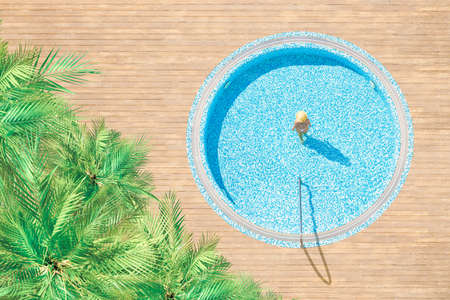 Aerial drone view on on wooden terrace and palm trees. Tropical summer luxury hotel. View from aboveの写真素材