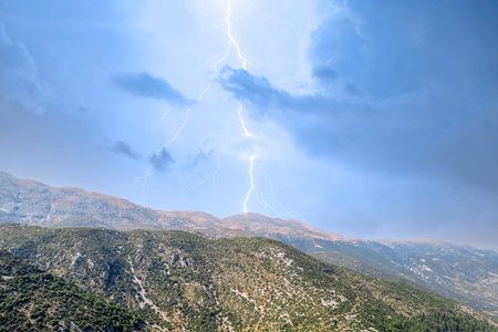 Lightning strike on the cloudy sky in the mountain.