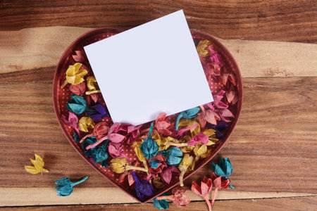Valentine wooden background with hearts and flowers