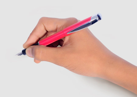 Hand writing with pen isolated on white background