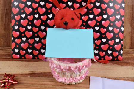 Valentine wooden background with hearts and flowersの写真素材