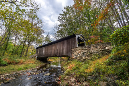 Rudolph and Arthur covered brige in Pennsylvania during Autumn