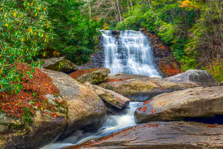 Muddy creek waterfall in the Appalachian mountains during Autumn with Fall colorsの写真素材