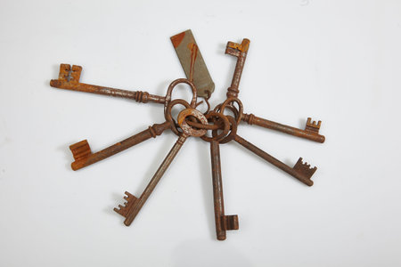 rusty keys on white background