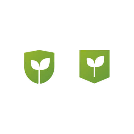 logo of plant bud with two small leaves inside shield shapesのイラスト素材
