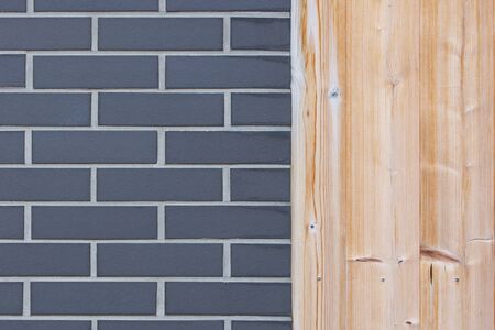 Wall from wood plank and gray brickの写真素材
