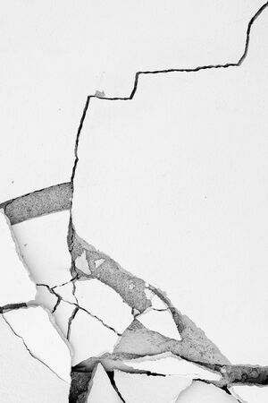 black and white cracked floor texture backgroundの写真素材
