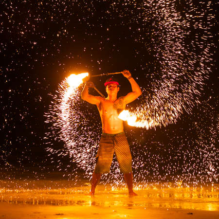 Rayong, Thailand - September, 29, 2014: amazing Fire Show on the beach at night on September, 29, 2014 at Samed Island, Rayong, Thailand.のeditorial素材