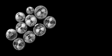 black and white, monochrome shot, top view of single micro coil with japanese organic cotton wick in high end rebuildable dripping atomizers isolated on black background, selective focusの写真素材