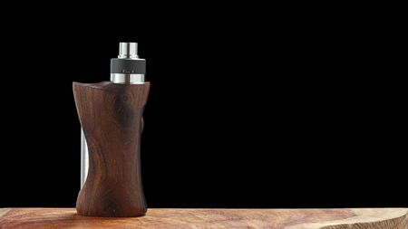 high end rebuildable dripping atomizer with natural stabilized wood regulated box mods, vaporizer equipment, selective focusの写真素材