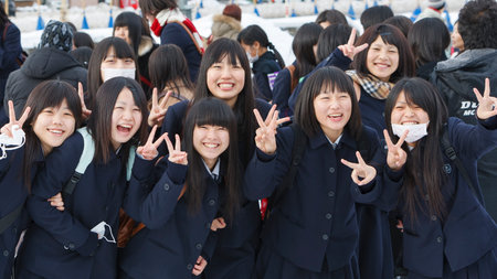 Hokkaido, Japan - December 14, 2011 : happy female Japanese junior high school students on December 14, 2011 at Otaru Canal, Hokkaido, Japan.のeditorial素材