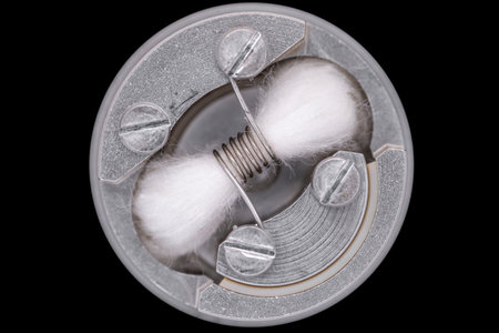 top view, close up, macro shot of single space coil with japanese organic cotton wick in high end...