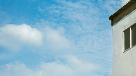 Look up the sky above the buildingの写真素材