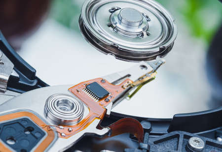 Open Harddisk cover and hard drives - hard disk drive is the storage of digital information in the computer.の写真素材