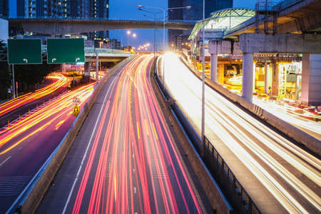 Road and light bulb in Bangkok city in rush hour.の写真素材