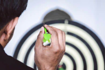 Businessman are throwing darts to the goal ahead.Business concept on a white background.の写真素材