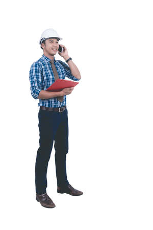 An Asian architect wearing a white helmet is communicating with a job and having a red file in his hand. On a white background isolated.の写真素材