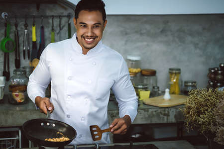 Asian chefs, cooking to be delicious and skilled.の写真素材