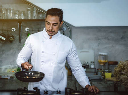Asian chefs, cooking to be delicious and skilled.の写真素材